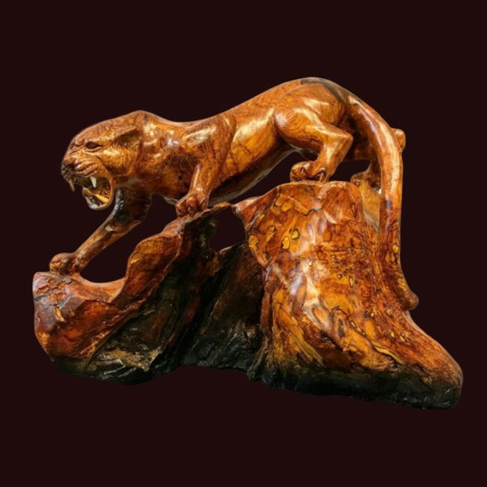 Tượng Báo săn mồi